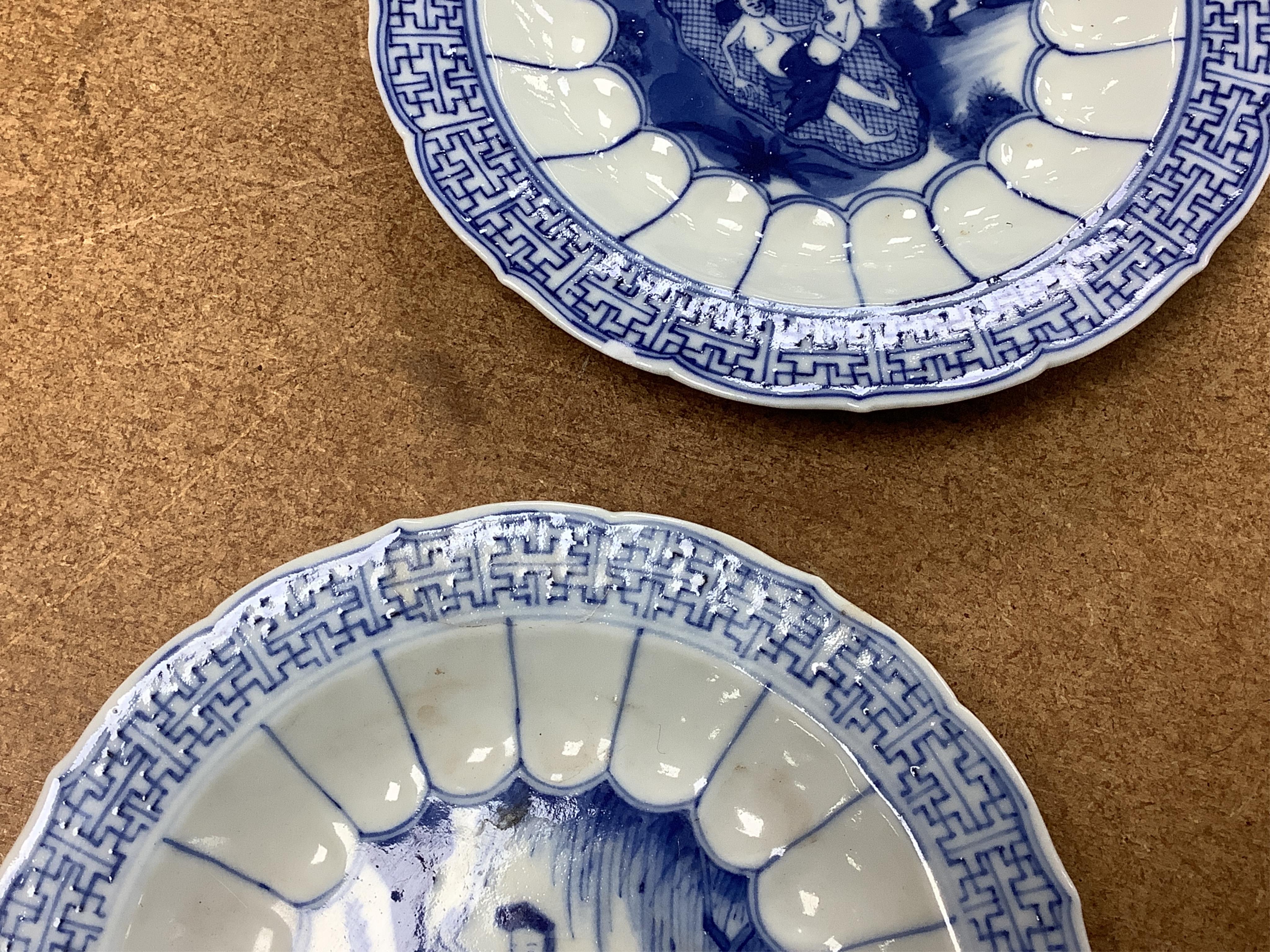 Two Chinese blue and white tea bowls and saucers, saucer 10cm diameter.